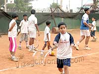 Children get tips in tennis