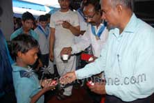 sri sathya sai seva organisation extends food relief and medical assistance to passengers stranded at vizag railway station