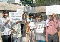 Dharna against demolition of KGH boundary wall