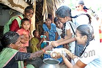 Students distributed food and clothes to the villagers