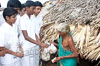 Students distributed food and clothes to the villagers