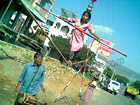 5 year Kadma performs on a rope balancing