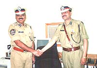 Mr B. Prasada Rao, IPS (Left) welcomes Mr V.S.K. Kaumudi, IPS