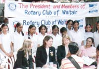 Swedish Rotary team interacting with school kids