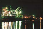 Illuminated Ship in the Harbour