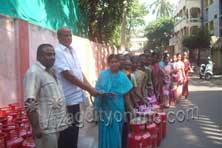 Corporator PAN Raju distributing Deepam Pathakam