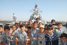 CROWDS THRONG NAVY MELA AND THE NAVAL SHIPS