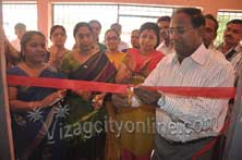 Commissioner inaugurating Library in Malkapuram high school
