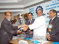 VSP CMD receiving 'Best Productivity Award' from Chief Minister