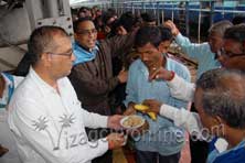 sri sathya sai seva organisation extends food relief and medical assistance to passengers stranded at vizag railway station