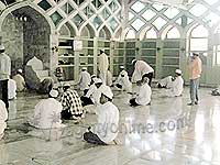 Muslims offering prayers at Mecca Masjid